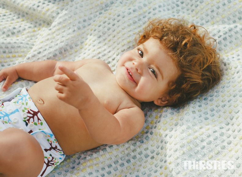 Baby wearing Thirsties Natural One Size All in One